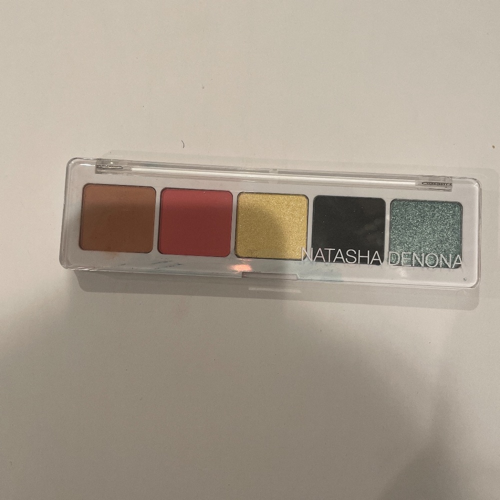 Selling Natasha Denona makeup.